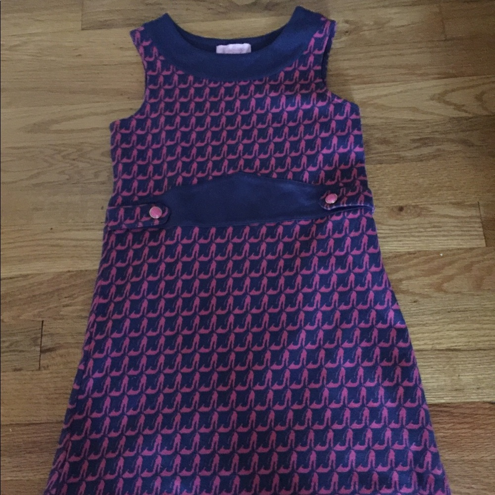 A high heeled patterned navy blue dress.